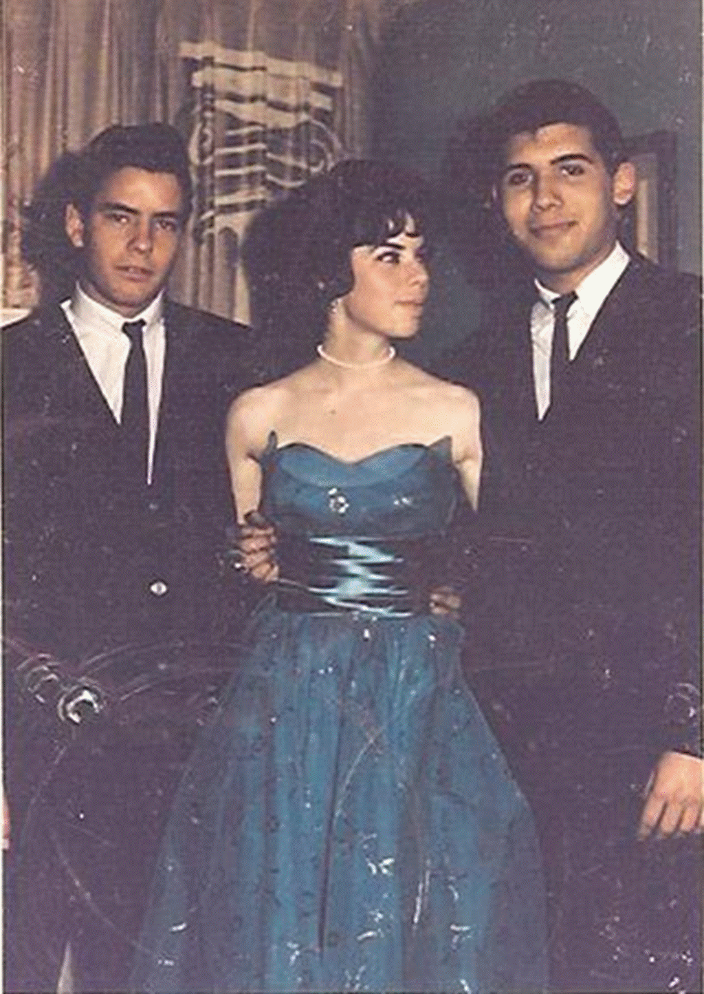 A group of people posing for the camera Description automatically generated