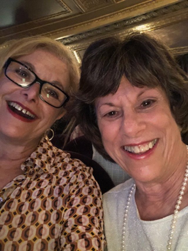 A group of people posing for the camera Description automatically generated