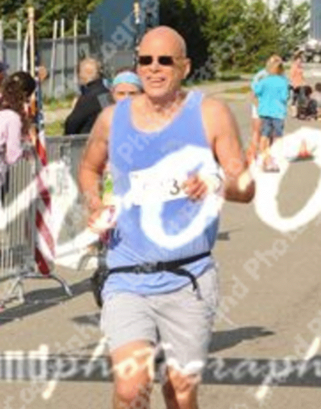 A person standing in front of a crowd Description automatically generated