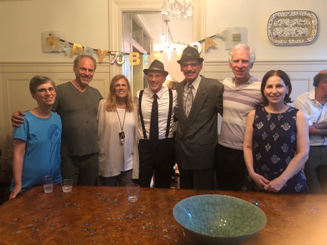 A group of people posing for a photo Description automatically generated