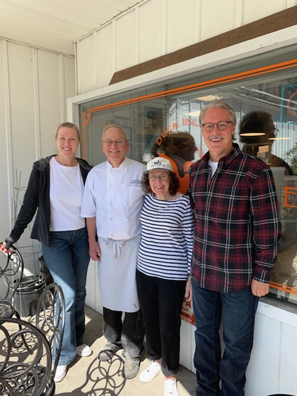 A group of people posing for the camera Description automatically generated