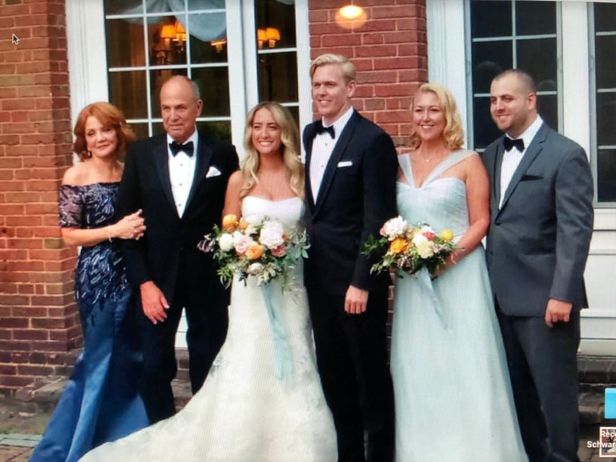 A group of people posing for the camera
Description automatically generated