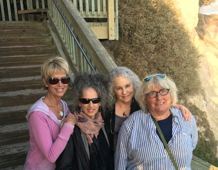 A group of people posing for the camera
Description automatically generated