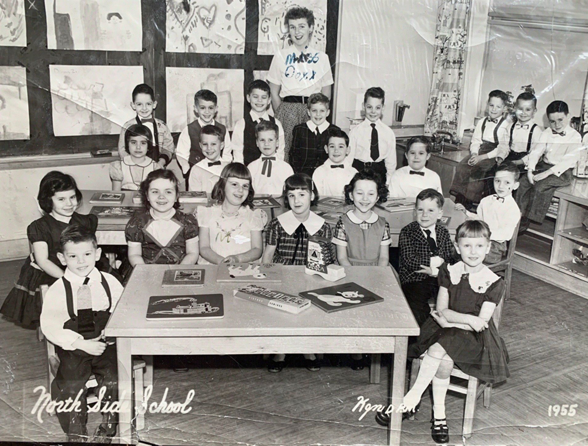 A group of people posing for a photo
Description automatically generated