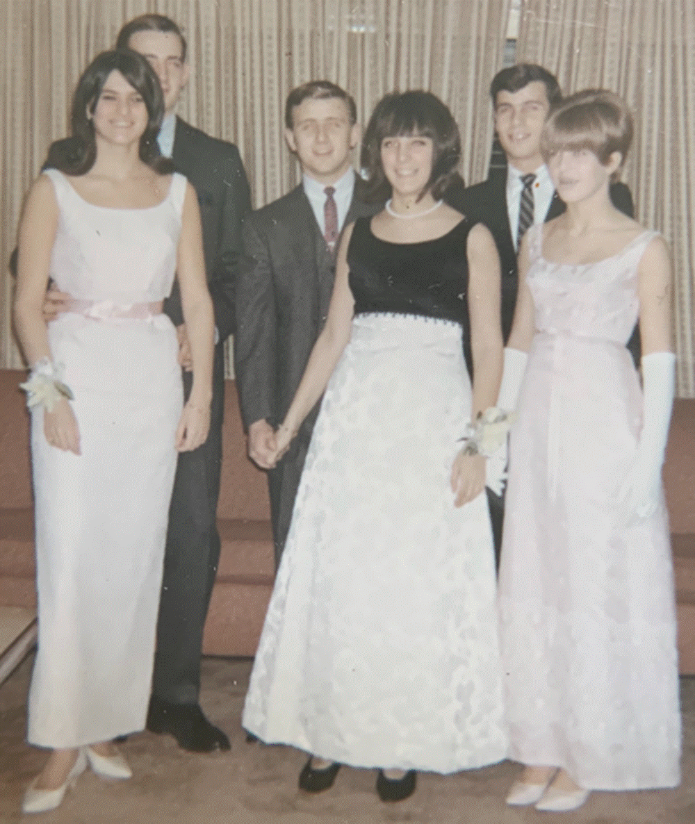 A group of people posing for the camera
Description automatically generated