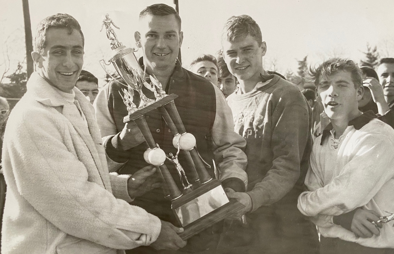 A group of people posing for a photoDescription automatically generated