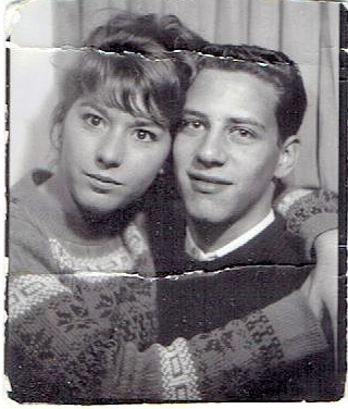 A close up of a logoDescription automatically generated