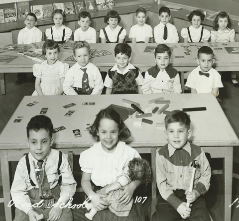 A group of people posing for a photoDescription automatically generated