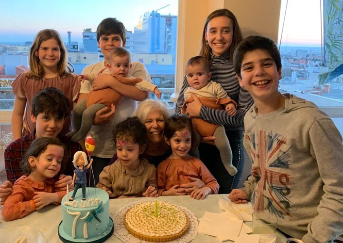 A group of people posing for a photoDescription automatically generated