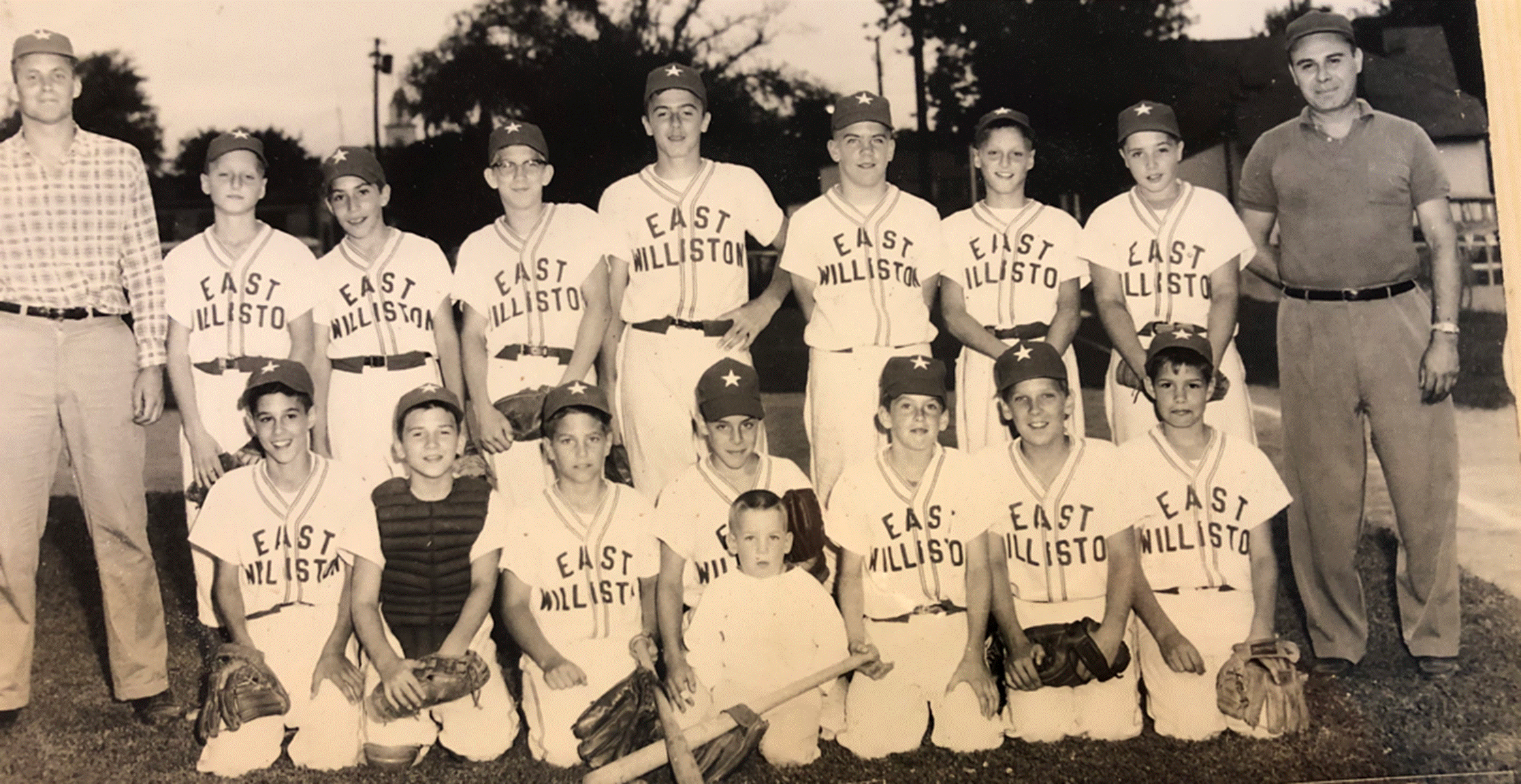 A group of people posing for a photoDescription automatically generated