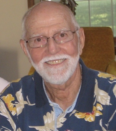 A person smiling for the cameraDescription automatically generated